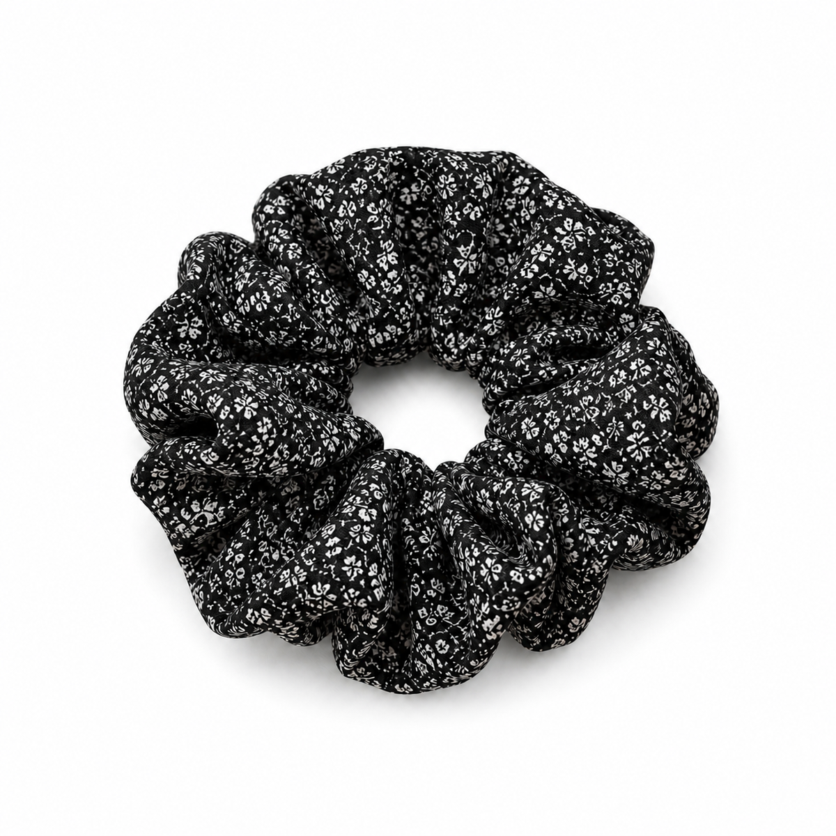 Black & White Ditsy Floral Scrunchie on a pure white background with a natural product shadow