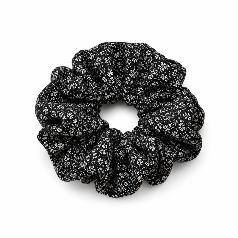 Black & White Ditsy Floral Scrunchie on a pure white background with a natural product shadow