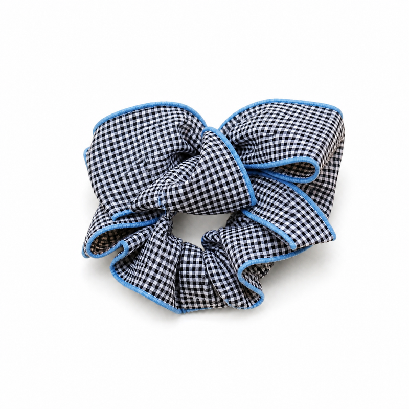 Blue Gingham Bow Scrunchie on a pure white background with a natural product shadow