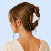 Adult model wearing Iridescent Mini Claw Clip Set against a pale blue studio background