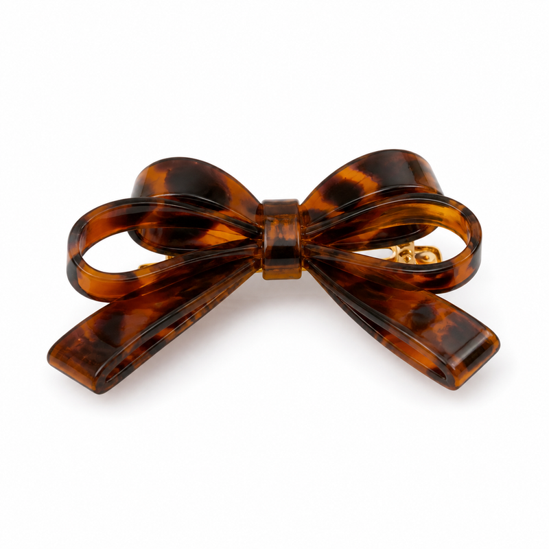 Vintage Acetate Bow Barrette on a pure white background with a natural product shadow