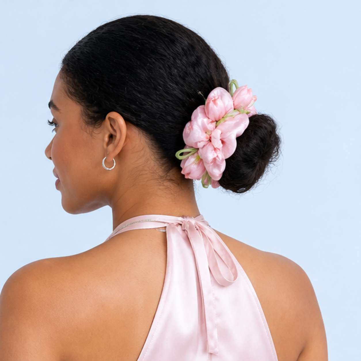 LUSTREPOP tulip scrunchie styled in a low bun