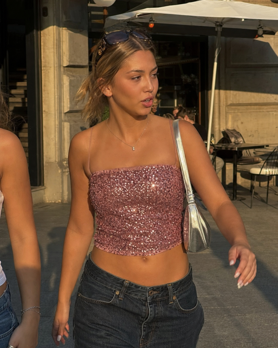 Starlight Sequin Bandeau Top styled outside a city café